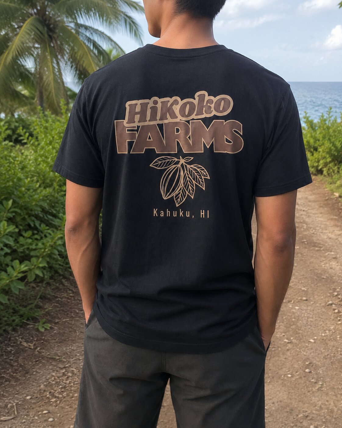 HI KOKO FARMS OG Tee worn on the farm trail overlooking the ocean in Kahuku, HI